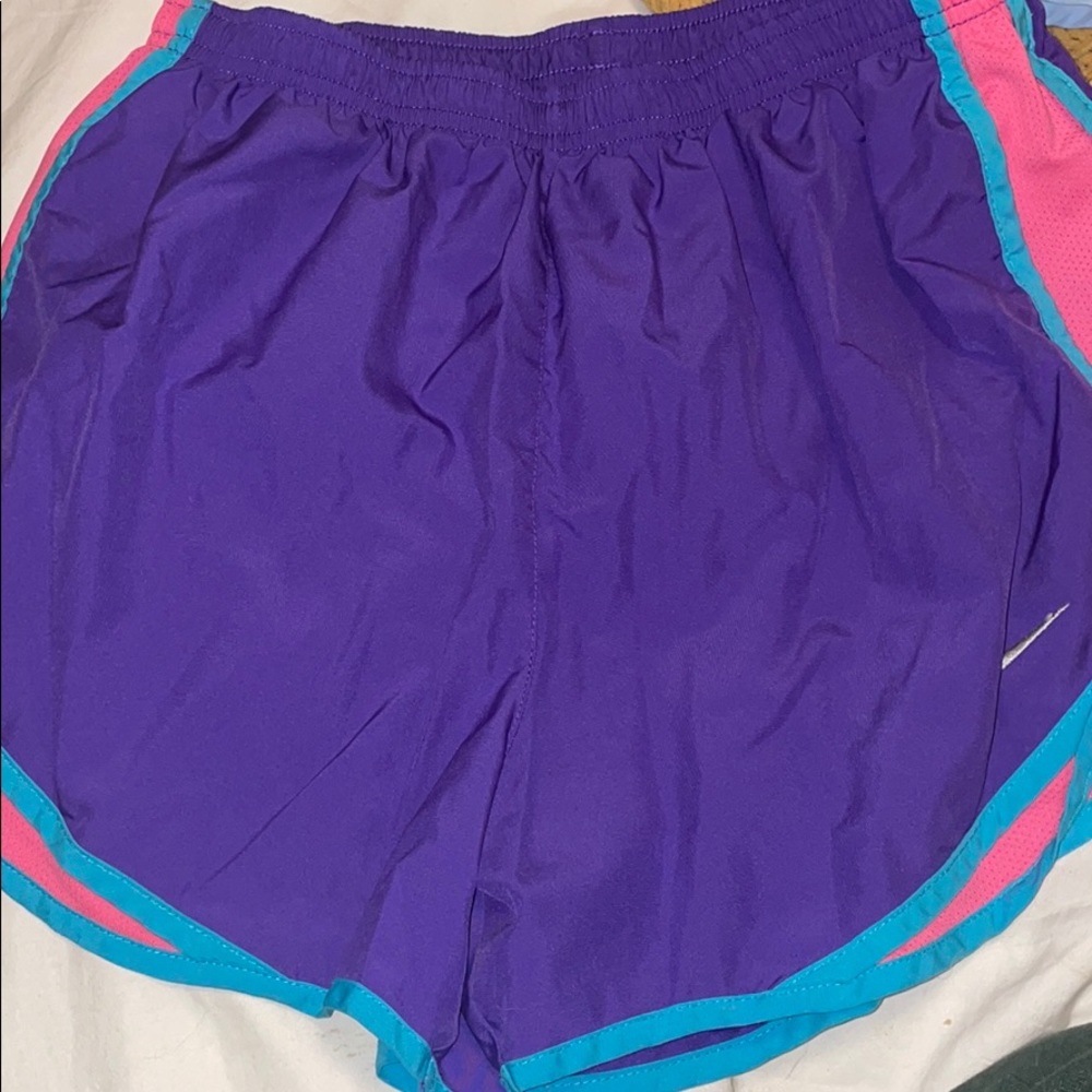 Purple, pink, blue Nike shorts